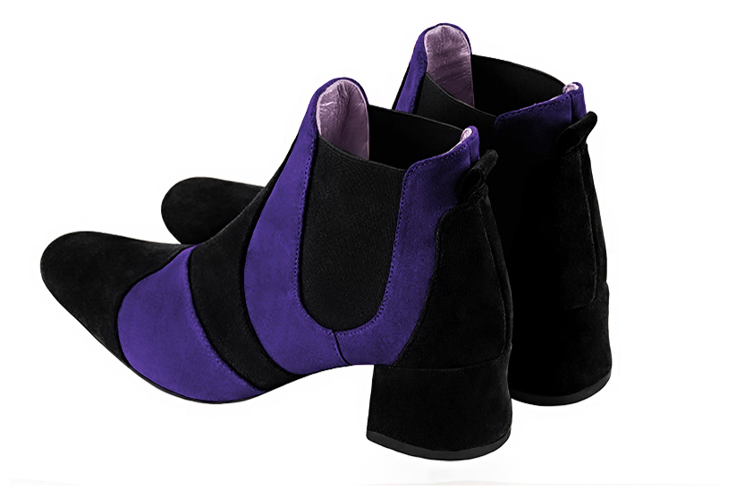 Matt black and violet purple women's ankle boots, with elastics. Round toe. Low flare heels. Rear view - Florence KOOIJMAN